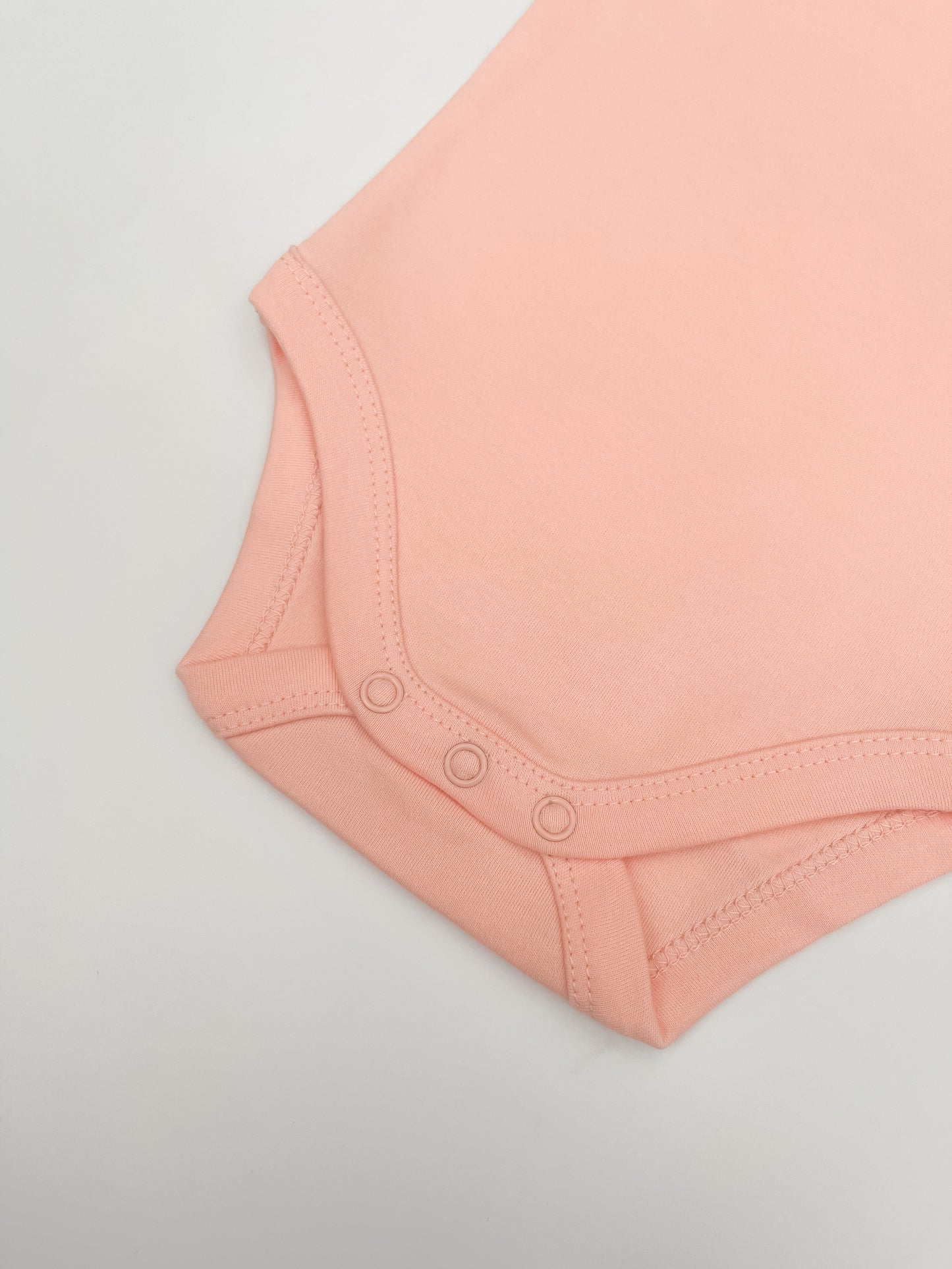 Organic Cotton Bodysuit in Coral