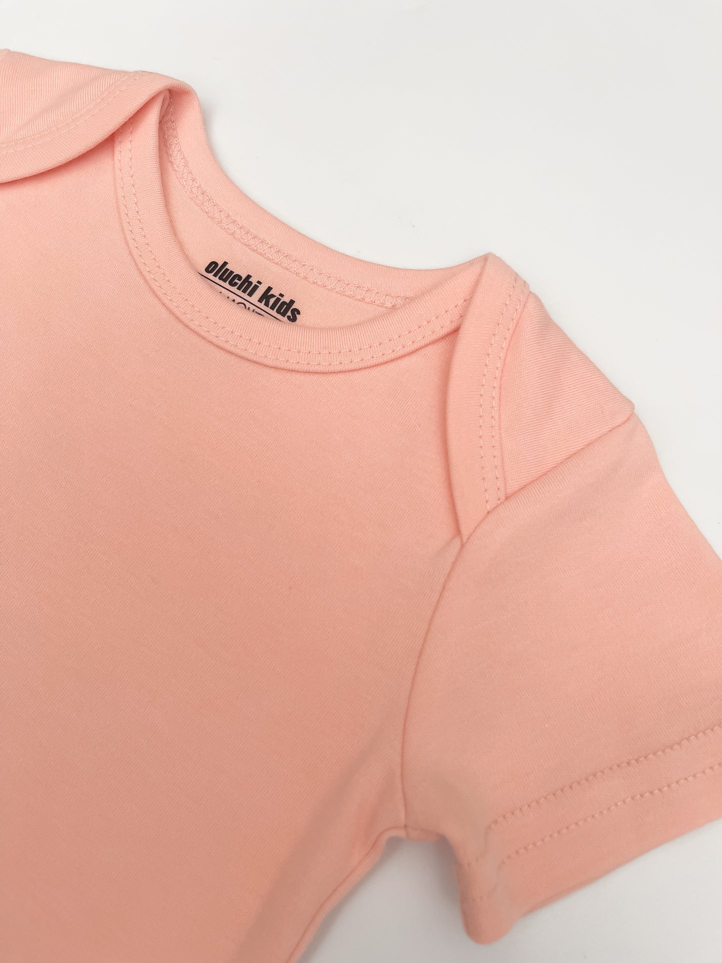 Organic Cotton Bodysuit in Coral